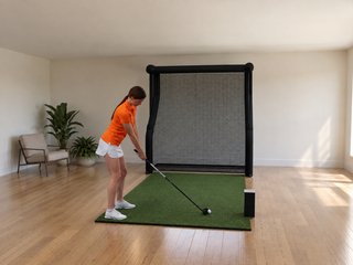 Bushnell Launch Pro Circle B Edition Net Golf Simulator in a finished room (room image)