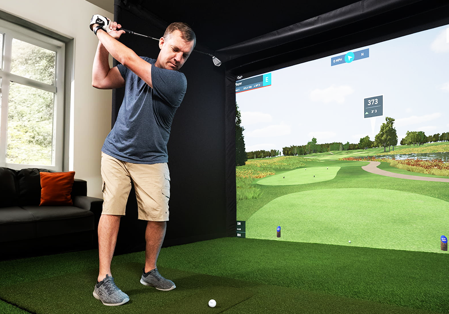 Pro All-In-One Golf Simulator in a finished golf room