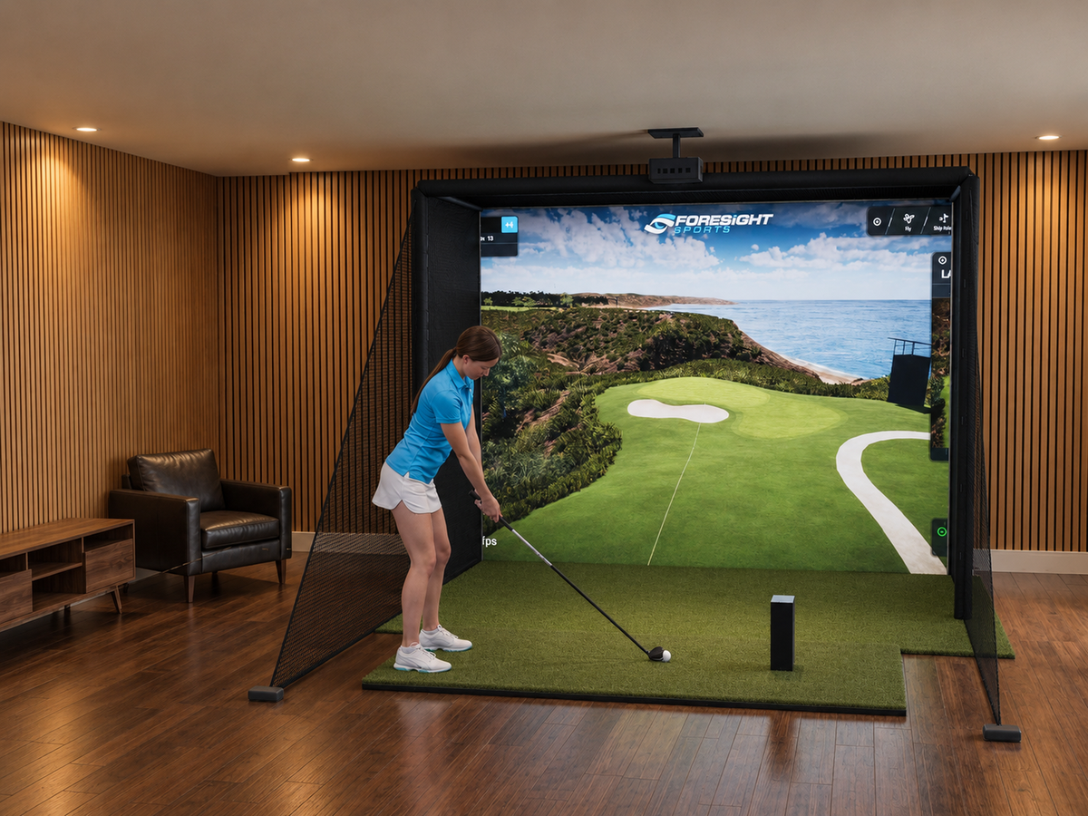 Foresight Sports GCQuad All-In-One Golf Simulator installed in a finished room