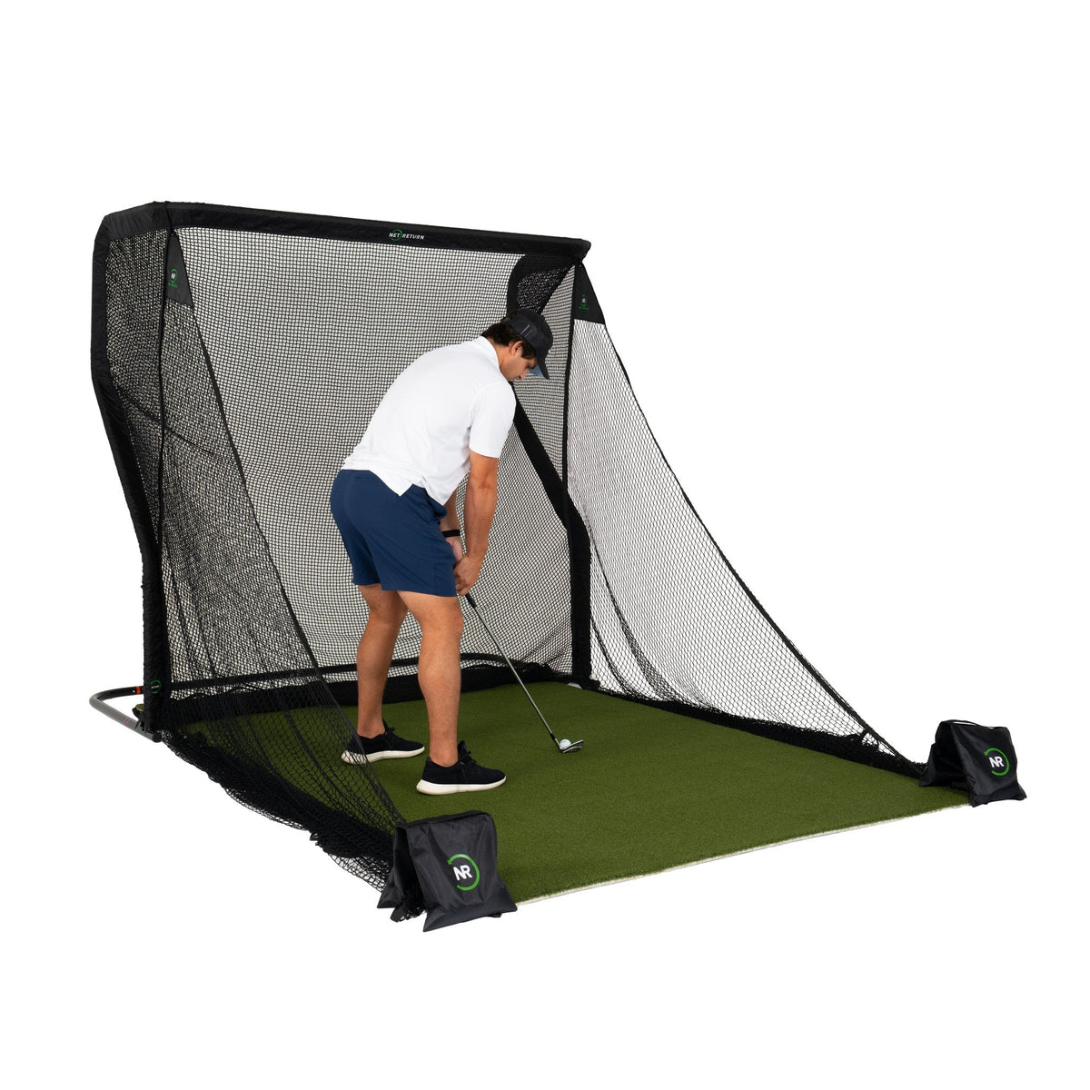 Golfer hitting into The Net Return Home Net & Mat Package