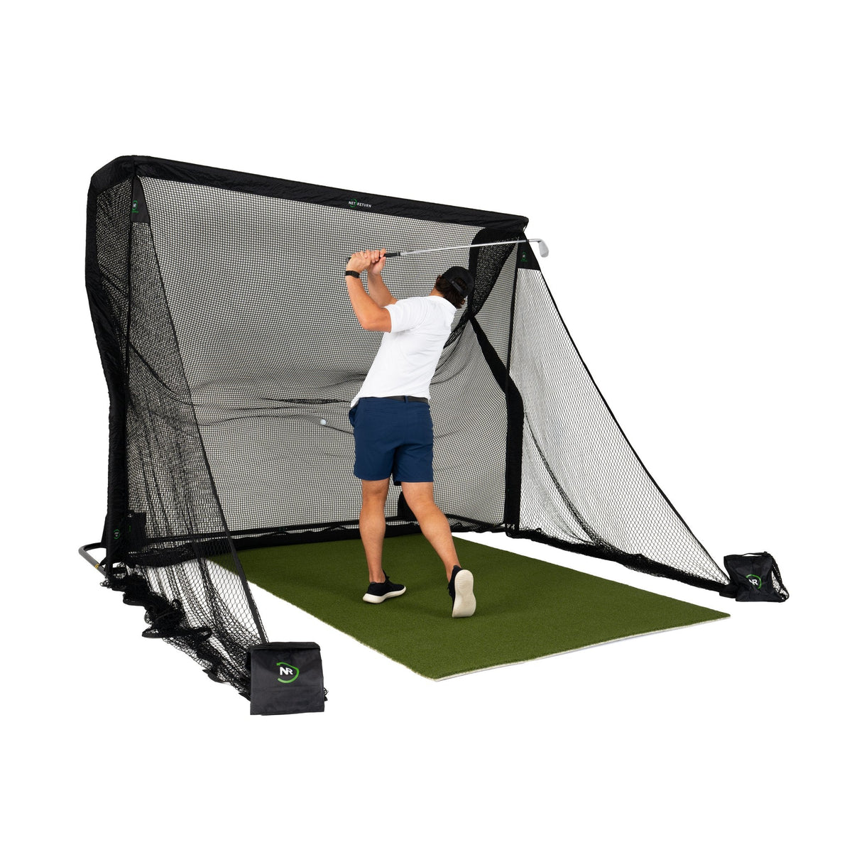 Golfer hitting into the Pro 10 net of The Net Return Pro Large Golf Package