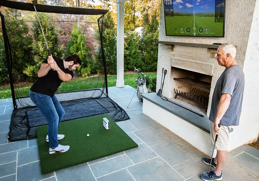 skytrak plus launch monitor and golf simulator backyard setup