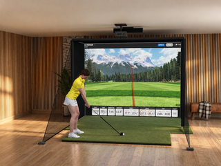 Uneekor EYE XO All-In-One Golf Simulator installed in a finished room