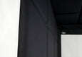Padded wall panels along the left wall