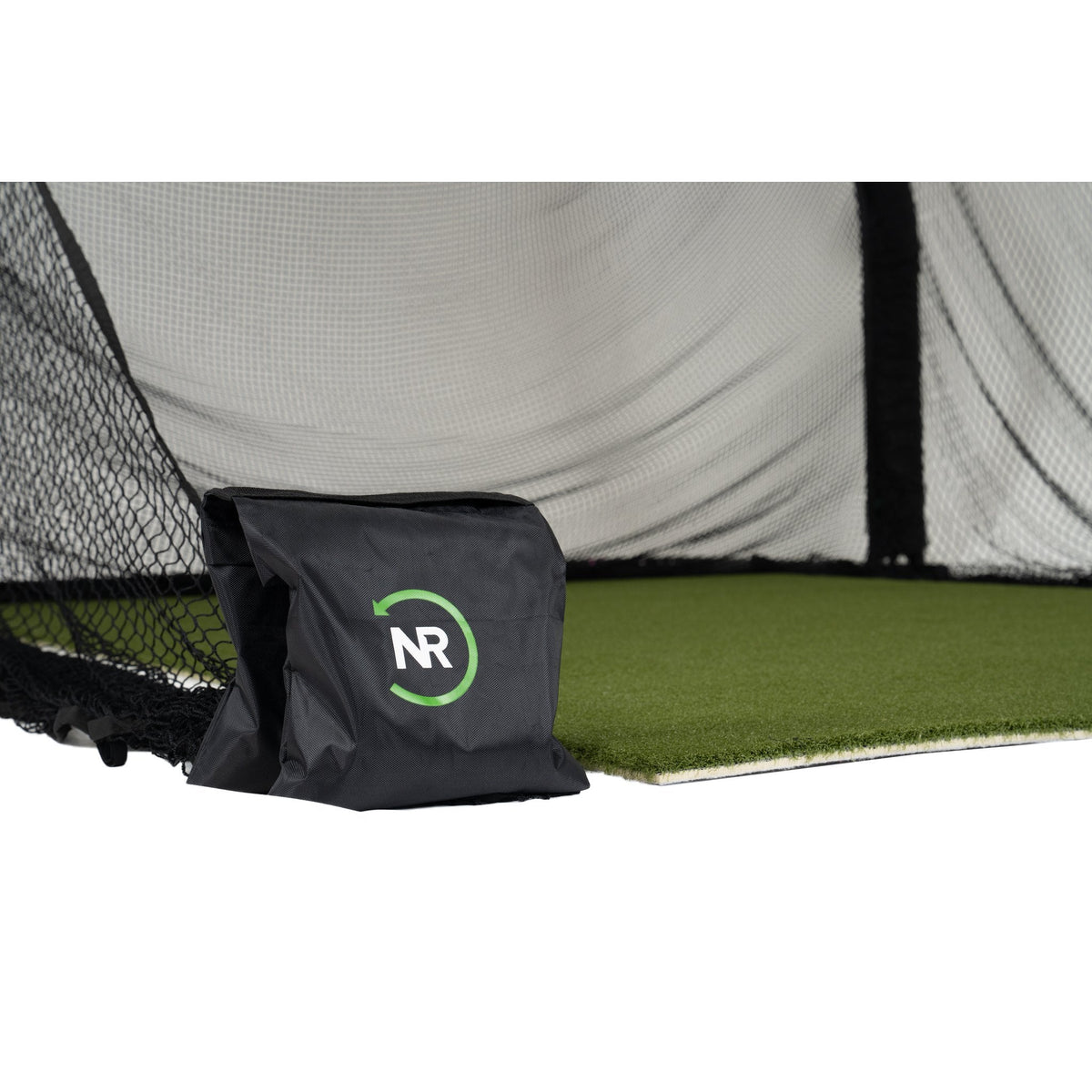 The Net Return sandbag anchoring a side barrier